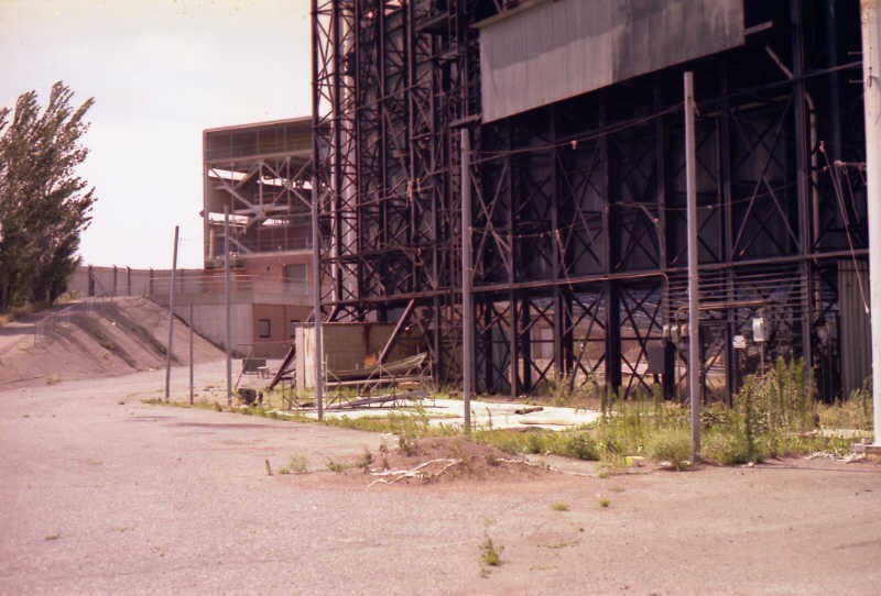 Behind the scoreboard (look closely for the ladder to climb up inside the scoreboard)