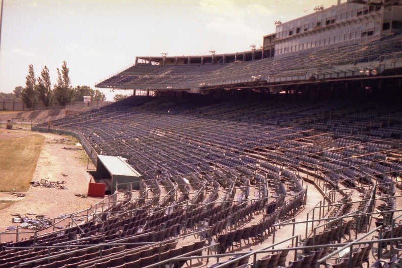The Twins dugout and box stands behind it sit empty