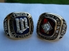 1987 and 1991 World Series rings side-by-side